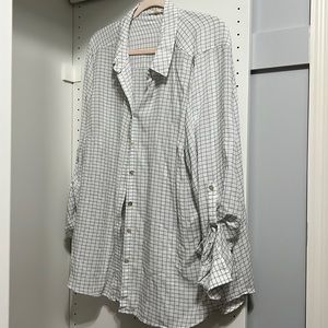 Long sleeved light weight button down blouse.